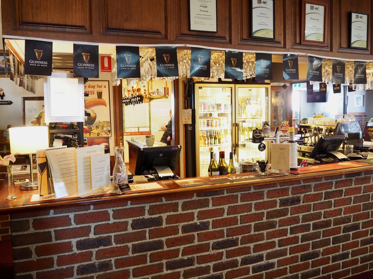 The specials board in The Poowong Hotel dining area displaying weekly food specials